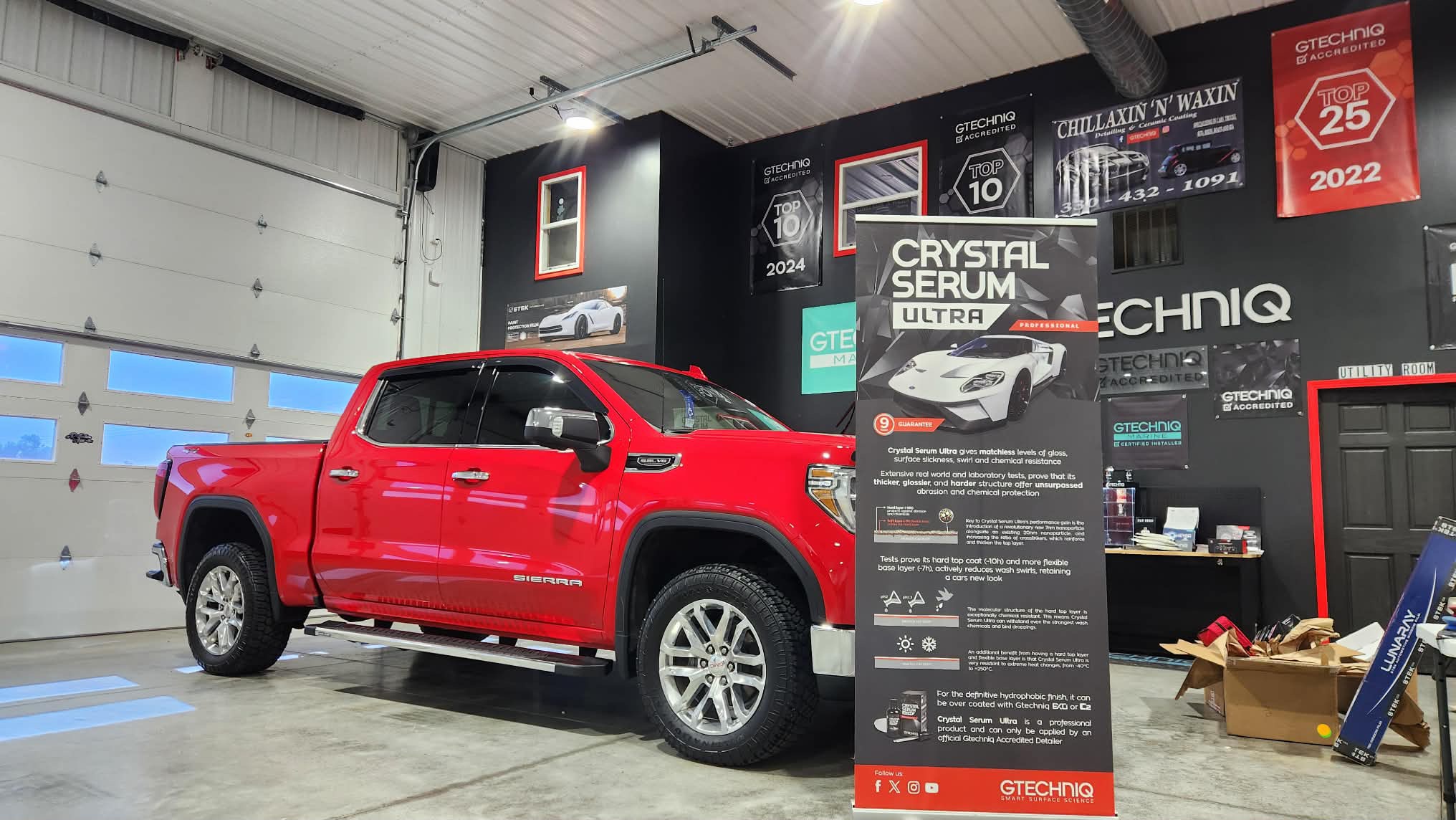 Red GMC Sierra after ceramic coating prep